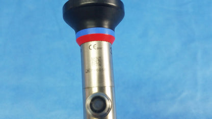 Silver oes elite wa2t430a rigid telescope with black ergonomic handle and red and blue bands near the top