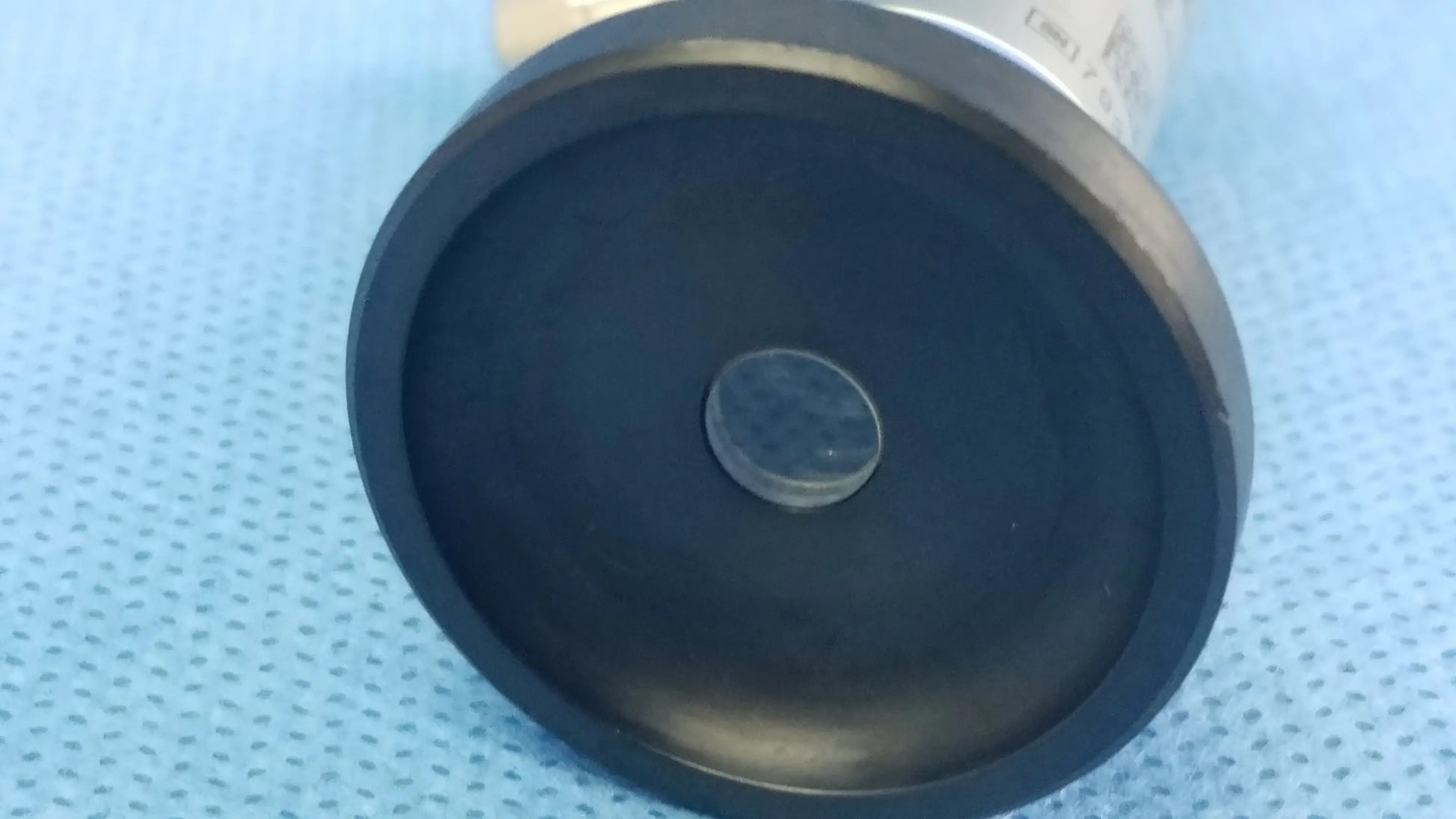 Black circular base with central transparent lens of olympus wa2t470a oes elite rigid telescope for medical applications