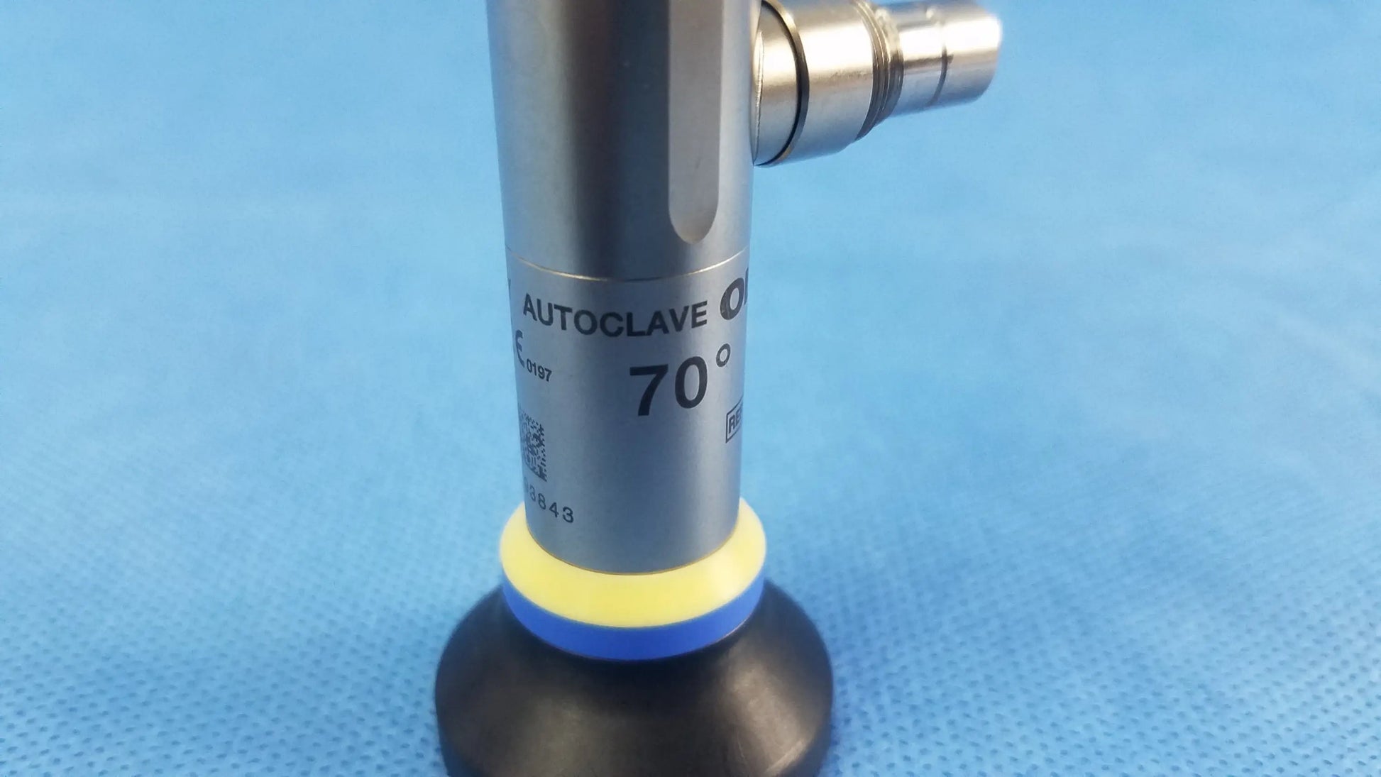 Silver cylindrical rigid telescope wa2t470a with black base and yellow-blue ring labeled autoclove 70° for oes elite use