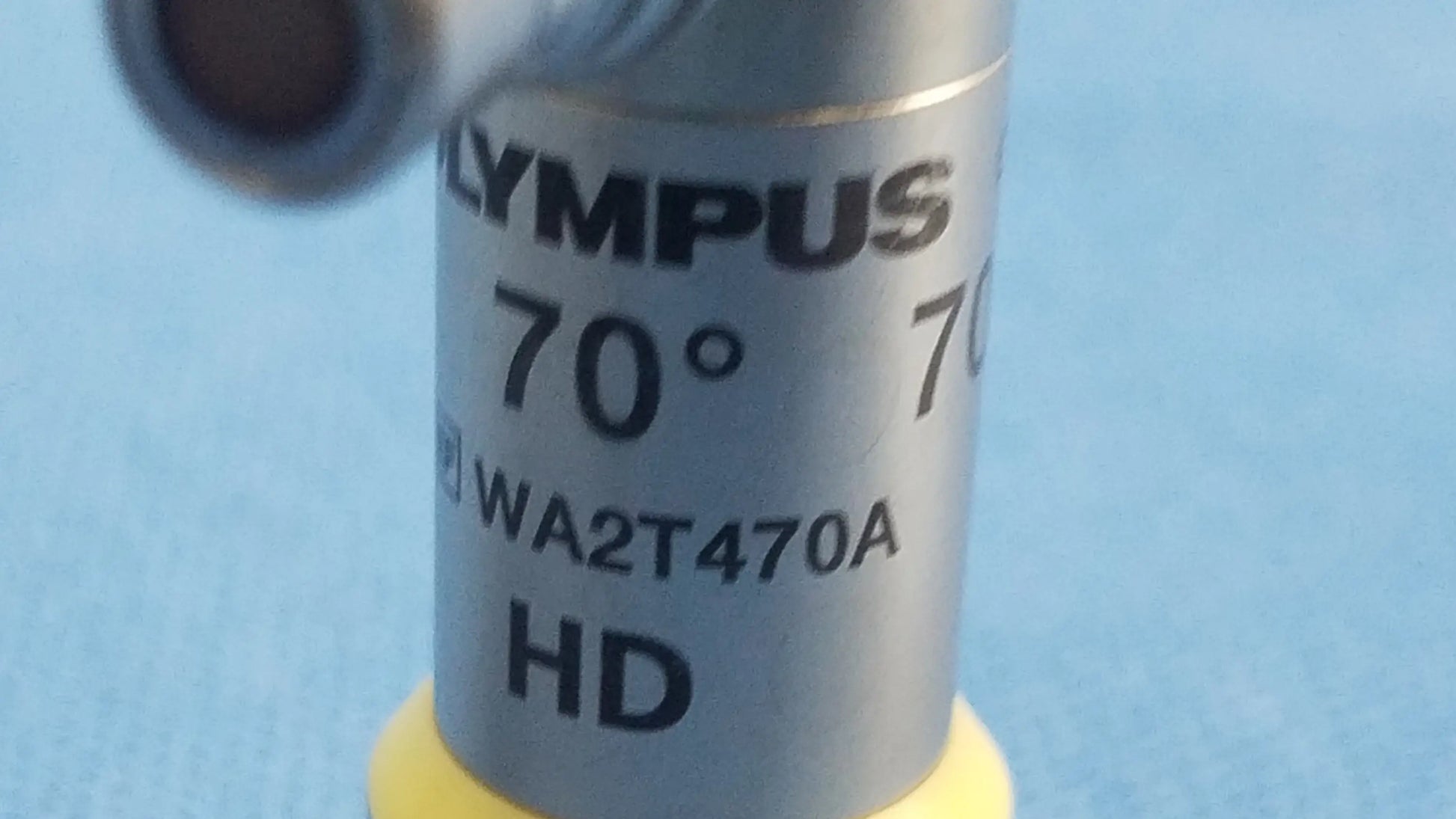 Silver cylindrical olympus oes elite wa2t470a rigid telescope hd lens with engraved markings and 70 degree view angle