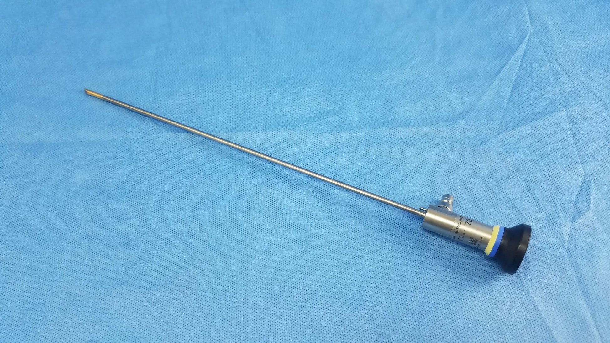 Silver Olympus WA2T470A oes elite rigid telescope with black and yellow grip for high definition surgical use