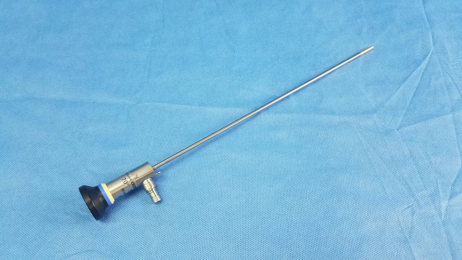 Silver surgical oes elite wa2t470a rigid telescope with black and blue rubberized handle and long metallic shaft