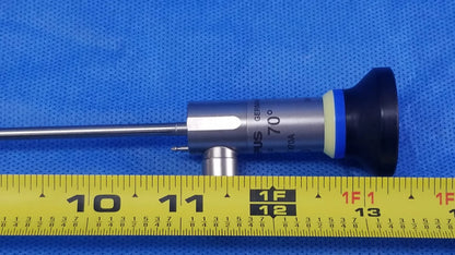 Silver rigid telescope wa2t470a oes elite with black tip blue-yellow ring marked 70 degrees on metallic body