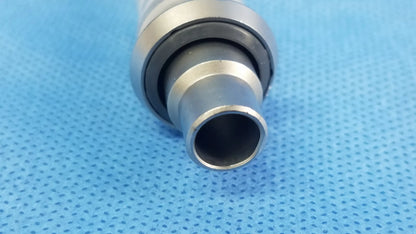 Silver metallic cylindrical pipe with threaded end and concentric rings evacuation adapter compatible olympus outer sheath