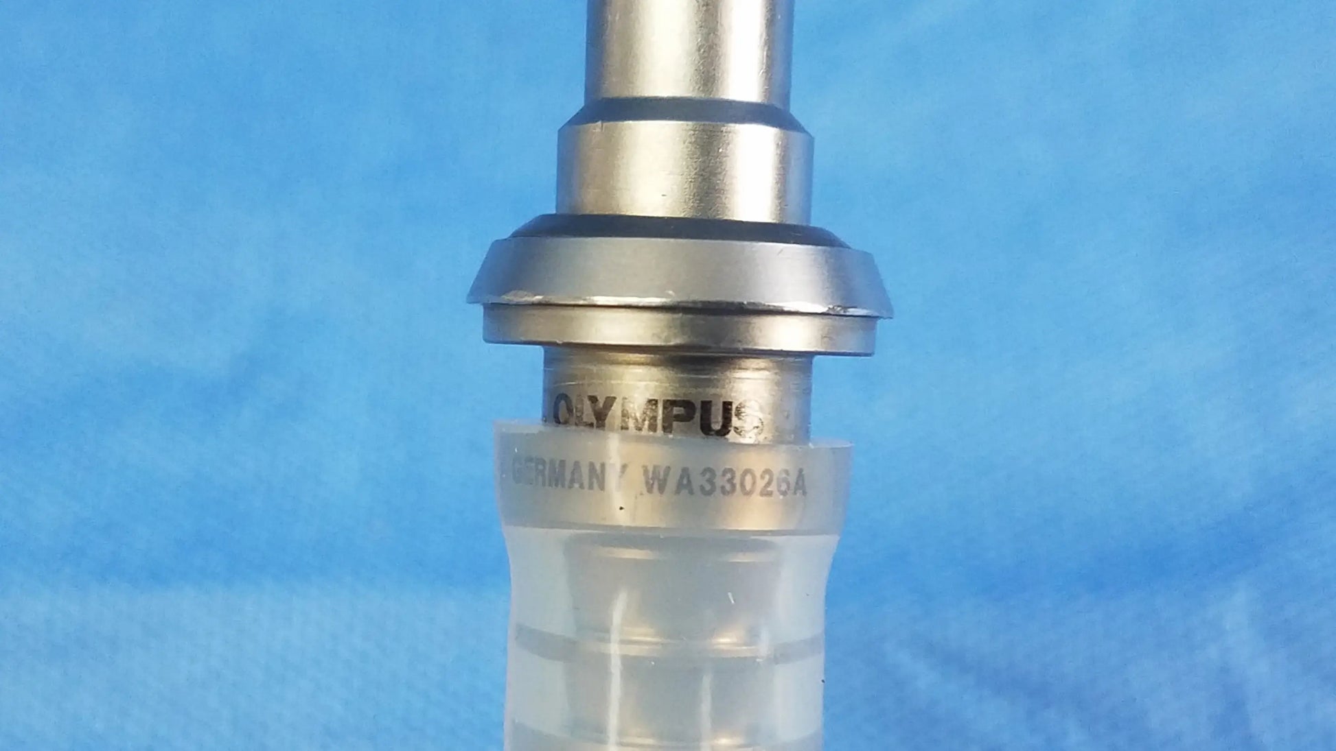 Silver metallic olympus wa33026a evacuation adapter with transparent protective cap compatible with outer sheath