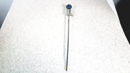 Silver olympus wa50373 autoclaveable laparoscope with blue-tipped handle and metallic shaft for surgical use