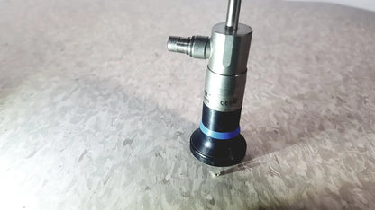 Silver and black olympus wa50373 autoclaveable laparoscope with blue ring near base for surgical use