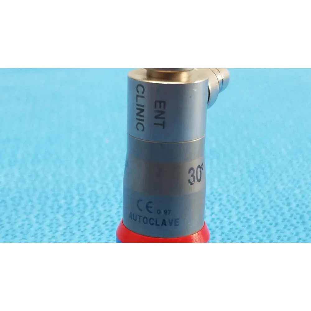 Silver cylindrical olympus wa96201a autoclavable ent sinuscope with 30° markings, red base, and gold-colored top