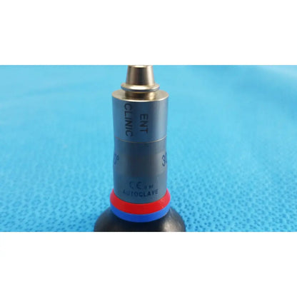 Silver metallic olympus wa96201a autoclavable ent sinuscope handpiece with red and blue rubber seal and engraved markings