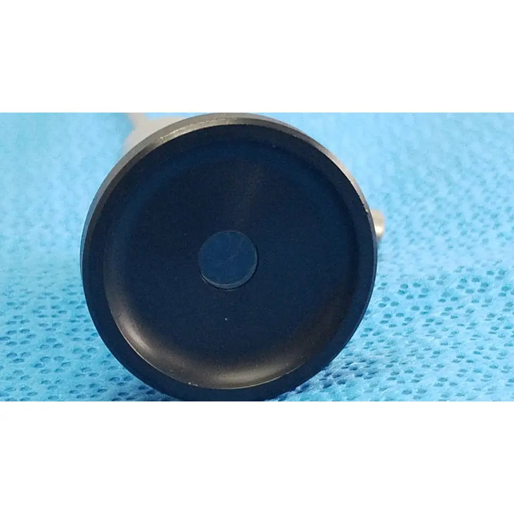 Black circular rubber base with central indentation for olympus wa96201a autoclavable ent sinuscope endoscope back side
