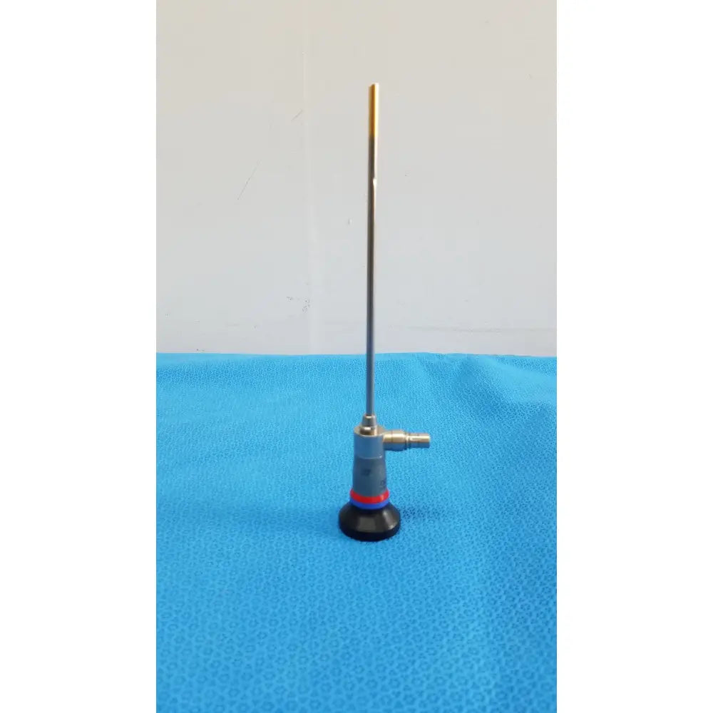 Silver olympus wa96201a autoclavable ent sinuscope endoscope with gold-tipped probe metallic joints and red accents