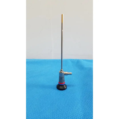 Silver olympus wa96201a autoclavable ent sinuscope endoscope with gold-tipped probe metallic joints and red accents