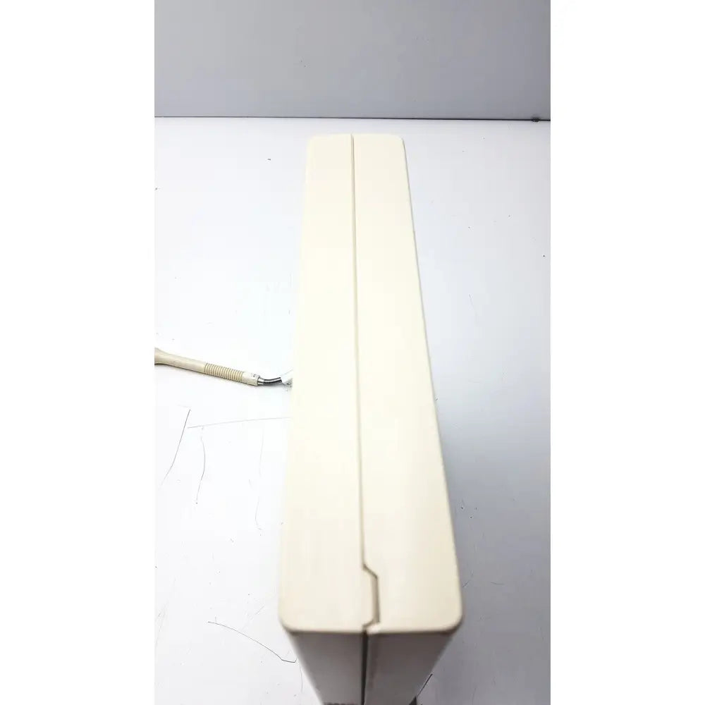 Cream-colored plastic case of omega ctxl-trh-w temperature and humidity chart recorder with a smooth rectangular design