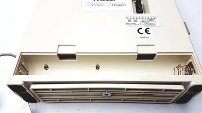 Beige omega ctxl-trh-w humidity chart recorder with black rubberized edges and vented front grille design