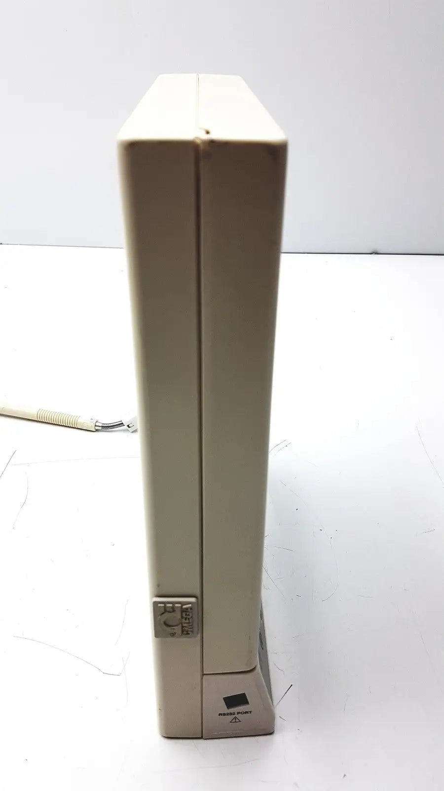 Beige plastic omega ctxl-trh-w humidity chart recorder showing the side label and energy star logo on the back side