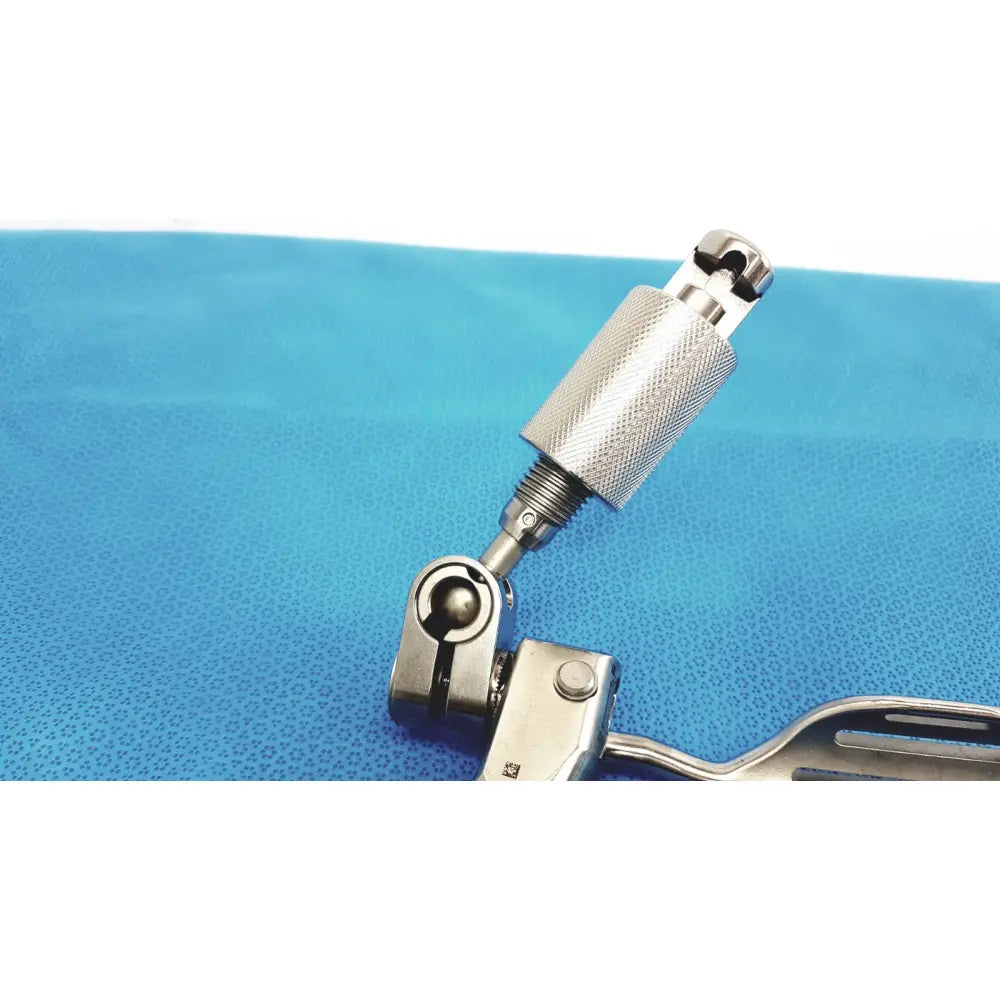 Silver surgical support arm with textured grip and articulated joint for stable surgical retraction use