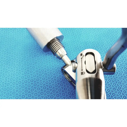 Silver surgical support arm with textured grip and adjustable joint mechanism for stable surgical retraction support