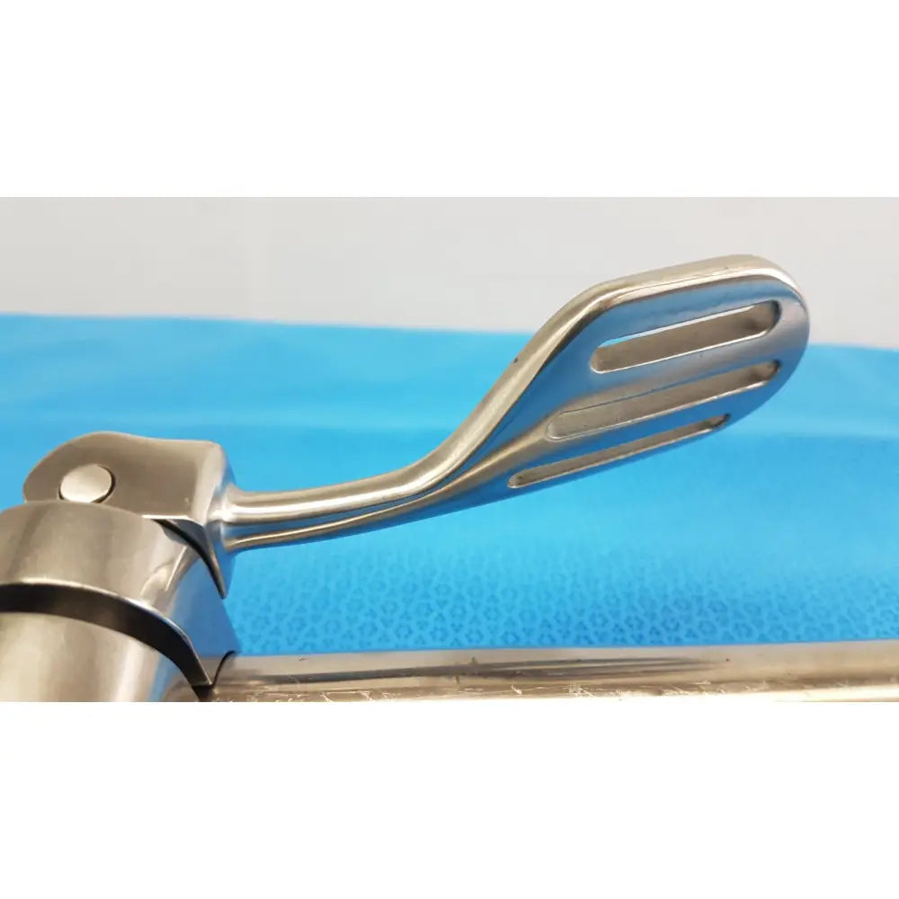 Shiny chrome-finished metal speed-tract field post foot pedal with curved design and three horizontal slots