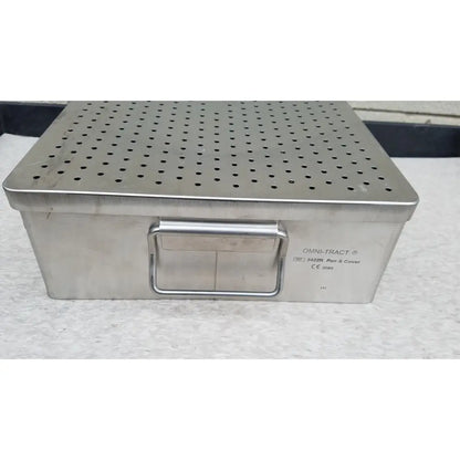 Silver stainless steel omni tract 3422r sterilization tray with perforated lid and integrated handle labeled omni-tract 342rr pan and cover
