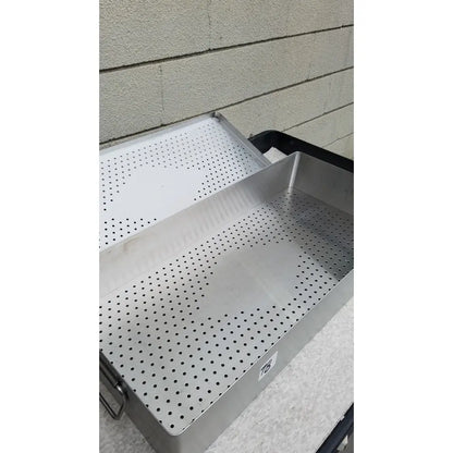 Silver perforated metal baking tray with handle for sterilization in omni tract 3422r stainless steel drain hole pan