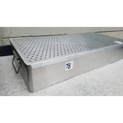 Silver stainless steel rectangular Omni Tract 3422r sterilization tray with perforated lid and side handle
