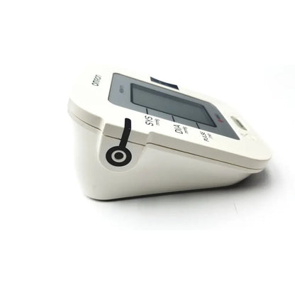 White omron advanced blood pressure monitor model HEM-711AC with sleek compact design and black sys dia pulse labeling