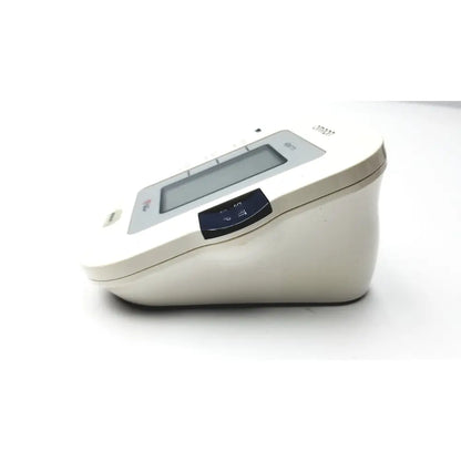 White plastic Omron advanced blood pressure monitor with digital display and black control buttons model HEM-711AC with box