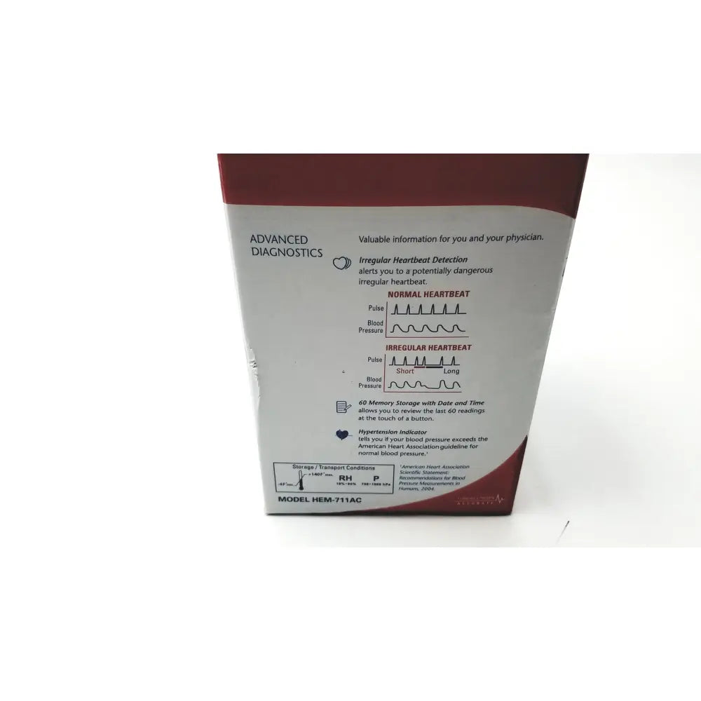 The omron advanced blood pressure monitor hem-711ac box with white and maroon design shows normal vs irregular heartbeat diagrams
