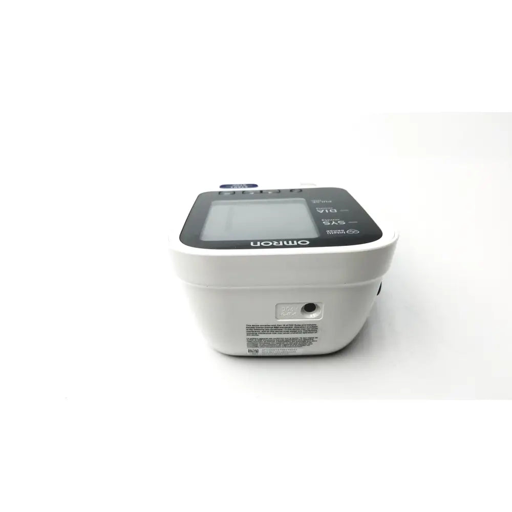 White Omron BO760N blood pressure monitor with black digital display and rounded edges for accurate health tracking
