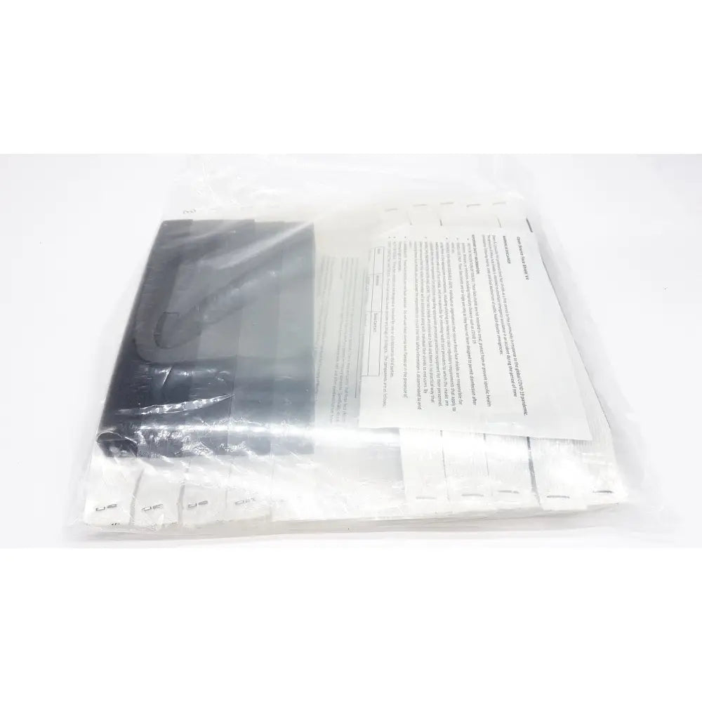 Black plastic case with white paper insert inside clear bag for open source face shield v4 braw protective equipment