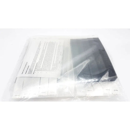 Black plastic case with white paper insert inside clear plastic bag featuring open source face shield v4 braw design