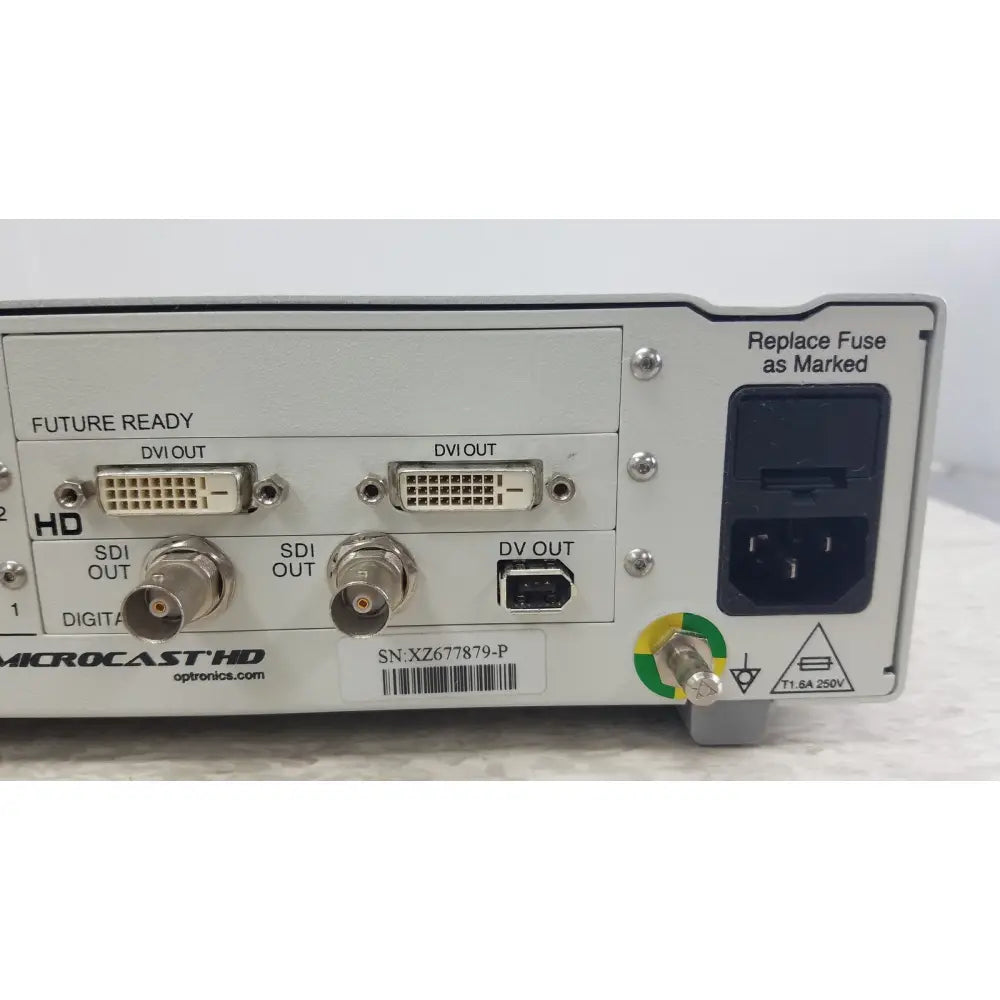 Silver-colored metal optronics microcast 3ccd 1080p hd device back side with dvi sdi and dv video output ports