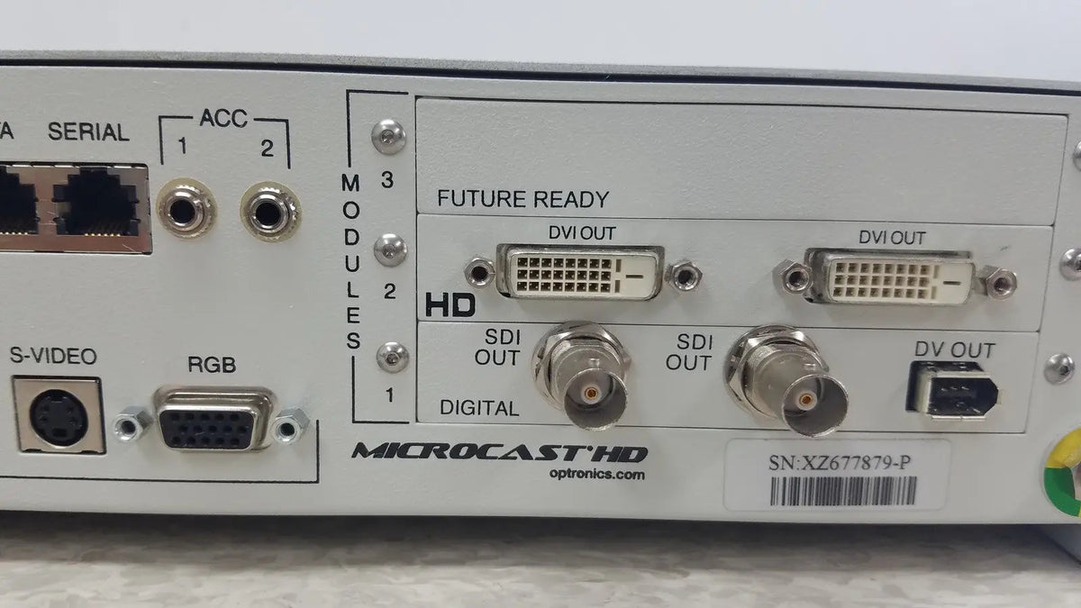 Back side of optronics microcast 3ccd 1080p hd video switcher with white metal chassis and sdi dvi hdmi ports