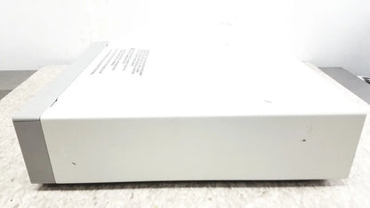 White rectangular electronic device with gray panels and label featuring optronics microcast 3ccd 1080p hd technology