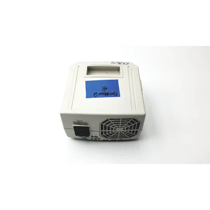 Off-white rectangular orascoptic zeon illuminator power supply unit with black ac input port and hexagonal vent grille on side