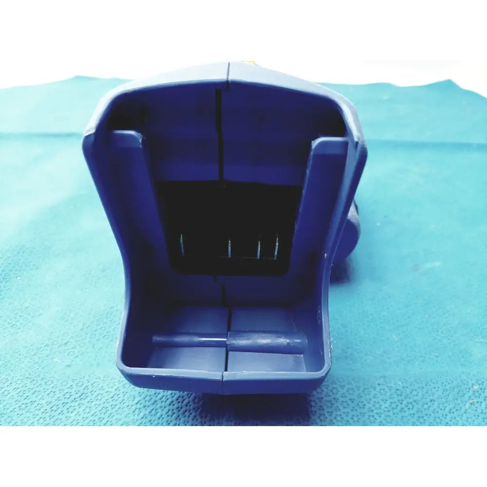 Blue plastic tool case with divided interior and four metal pins for orgapack or-t 250 battery operated cordless strapping tool