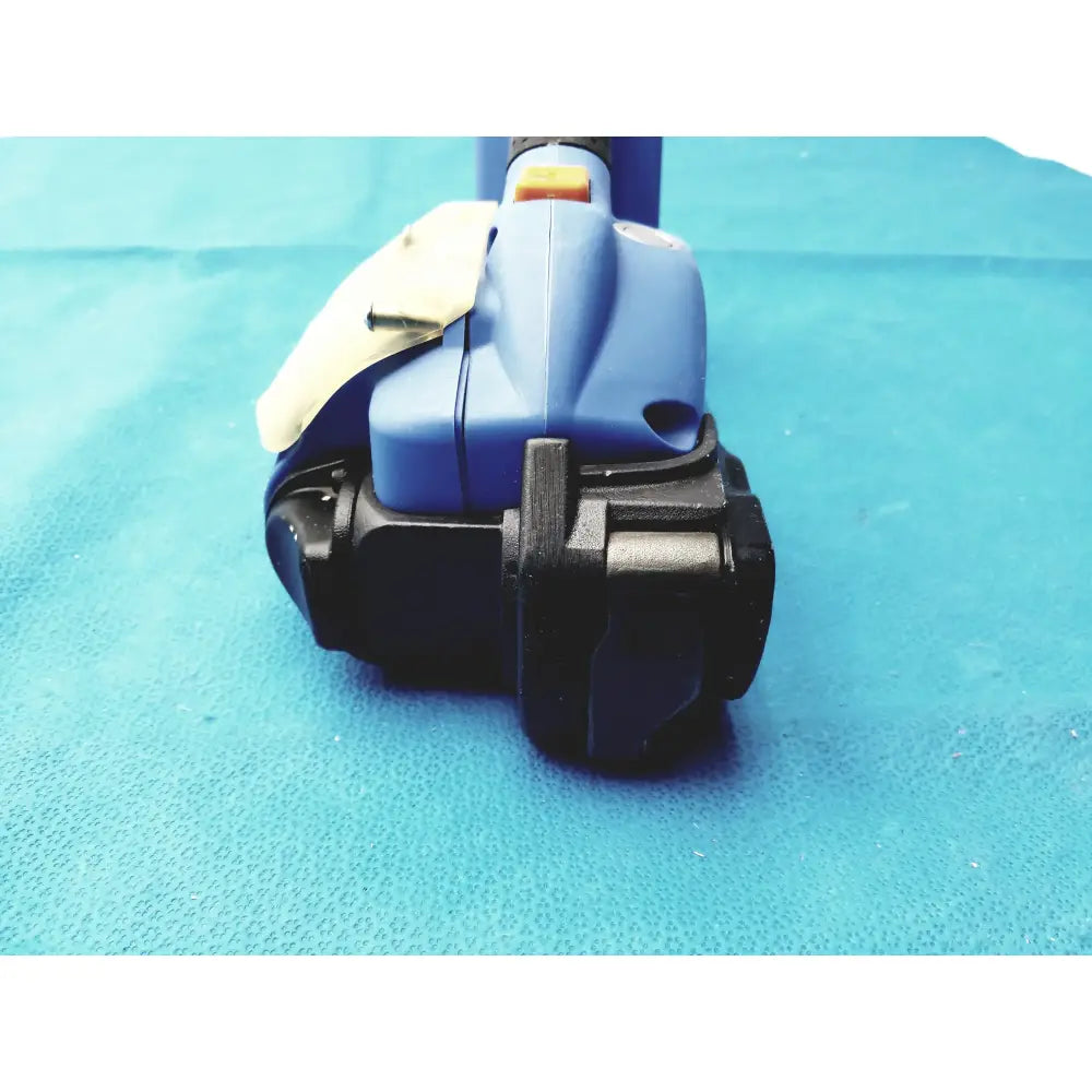 Blue and black handheld battery operated cordless strapping tool with yellow trigger for reuse medical equipment by orgapack