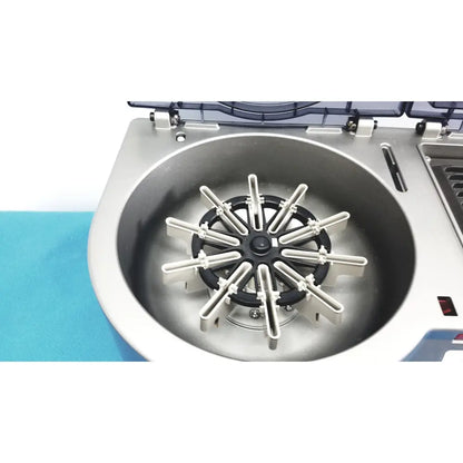 Silver centrifuge rotor with black hub and white plastic arms for laboratory use in ortho workstation ref 6904630 orthoclinical diagnostics