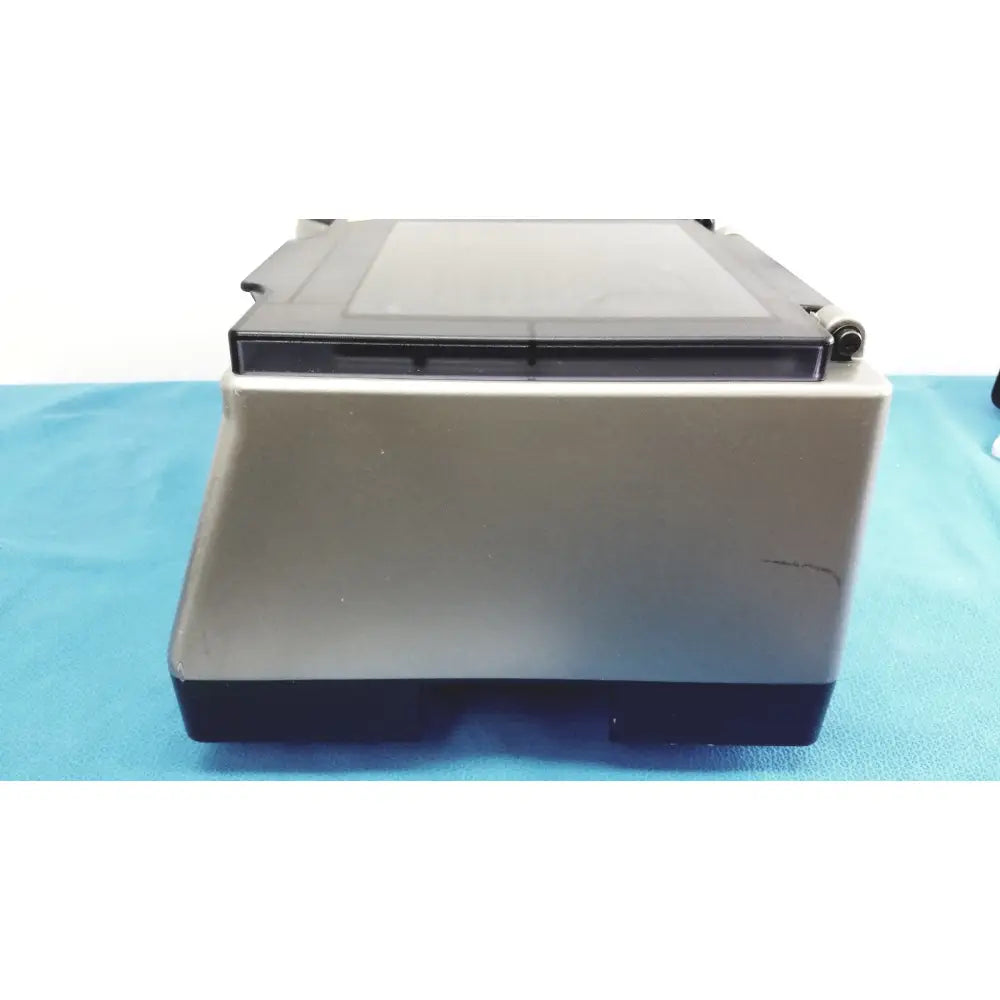 Silver and black matte desktop scanner of ortho workstation ref 6904630 by ortho clinical diagnostics 5100