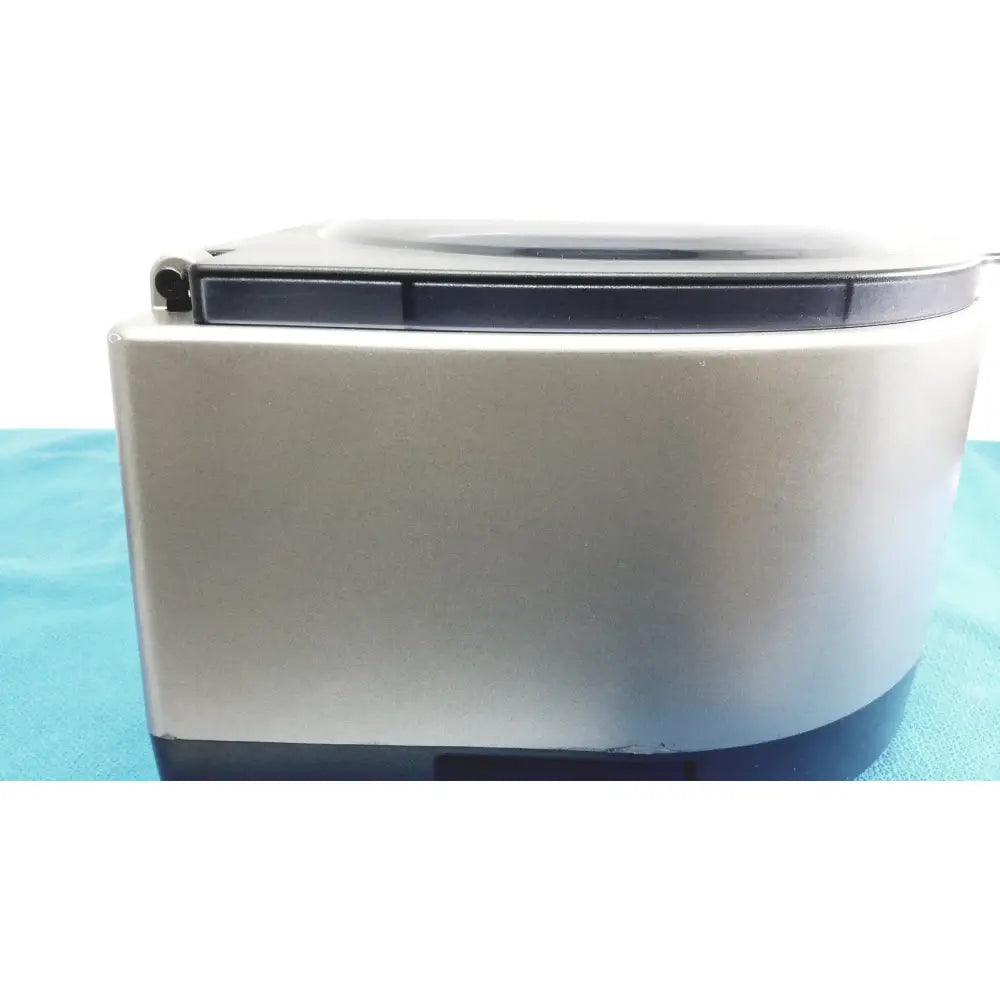 Silver and black plastic rice cooker with rounded lid for ortho workstation ref ortho clinical diagnostics 5100 product