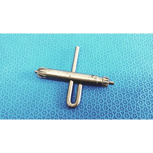Silver metal orthopedic drill chuck key with u-shaped handle and gear-like ends compatible with 3.8mm and 3.2mm pin holes