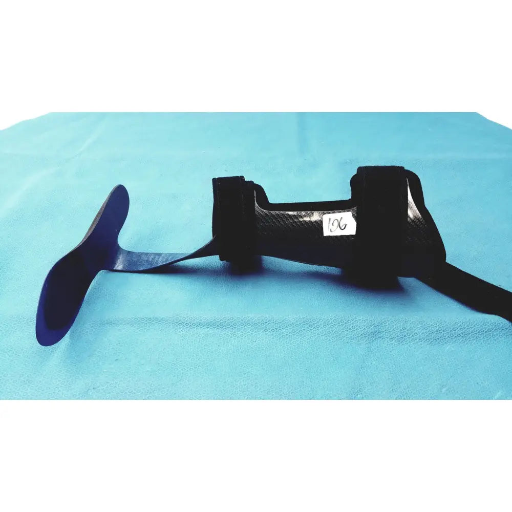 Black carbon fiber orthotic foot drop brace left foot with adjustable straps for support and stability