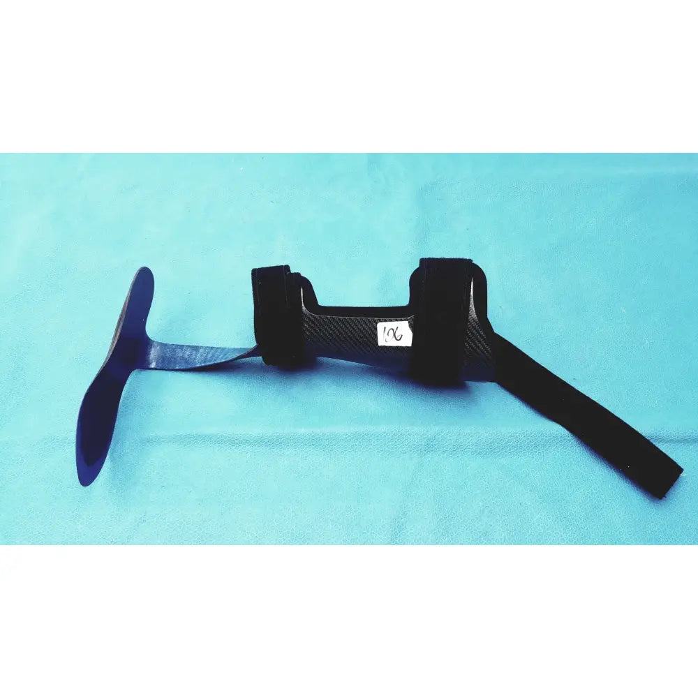 Black carbon fiber orthotic foot drop brace left foot with adjustable straps and central support structure