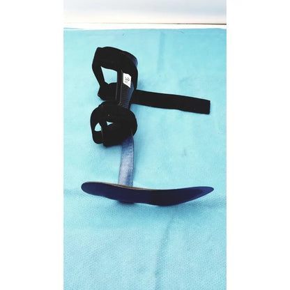 Black orthotic foot drop brace left foot with adjustable straps and curved metal plate for support and stability