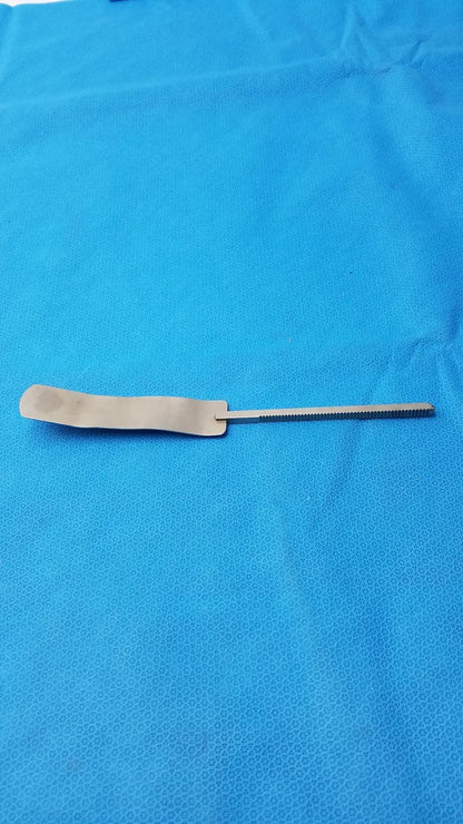Osteotome stainless steel surgical instrument with a flat rectangular handle and serrated steel surgical blade