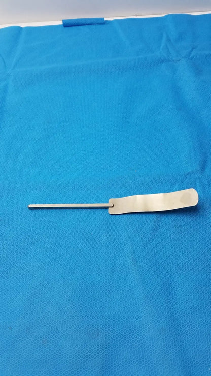 Osteotome stainless steel surgical instrument with a sleek metallic handle and flat rectangular blade for precision use