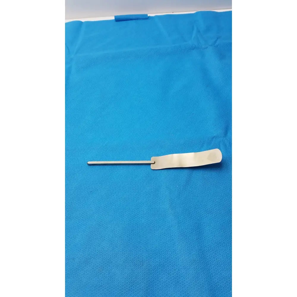 Osteotome stainless steel surgical instrument with a sleek metallic handle and flat rectangular blade for precision use