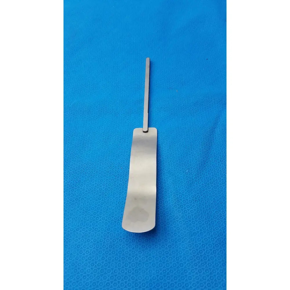 Osteotome stainless steel surgical instrument with a sleek rectangular handle and serrated edge in stainless steel