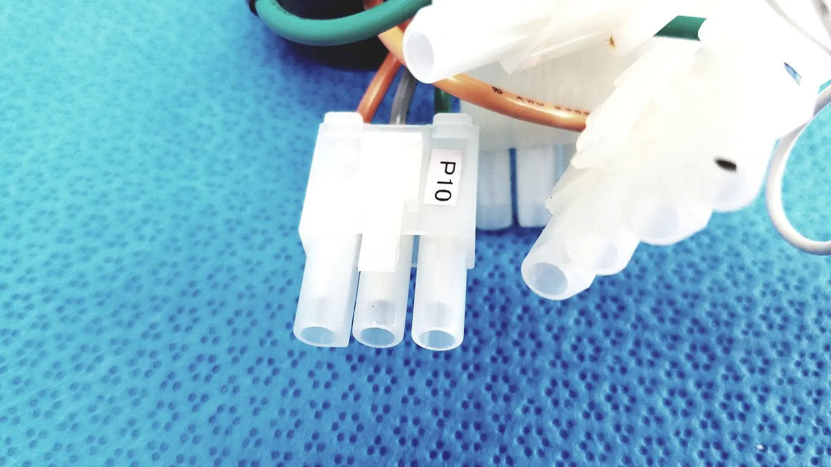 White plastic p10 electrical connector with three cylindrical ports for connectors wire harness cable applications
