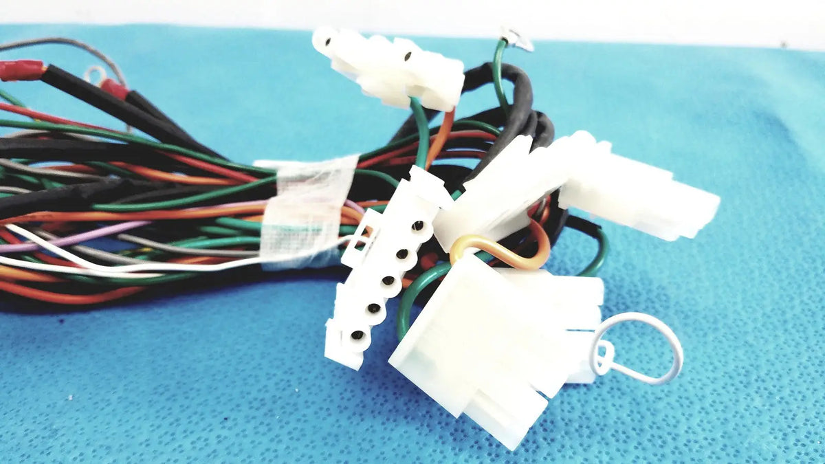 A bundle of multi-colored connectors wire harness with white plastic terminals in p10 103 multi-pin wire harness cable